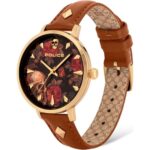 Police Brown Leather Watch with a floral-patterned black dial, gold-tone case, and studded brown leather strap.